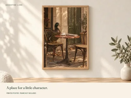 Cafe Duck shown in a frame; frame not included