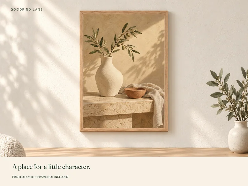 Still Olive print in a wooden frame on a wall; frame not included